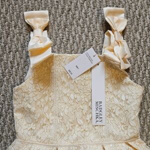 Size 7 girls dress champagne colour never worn